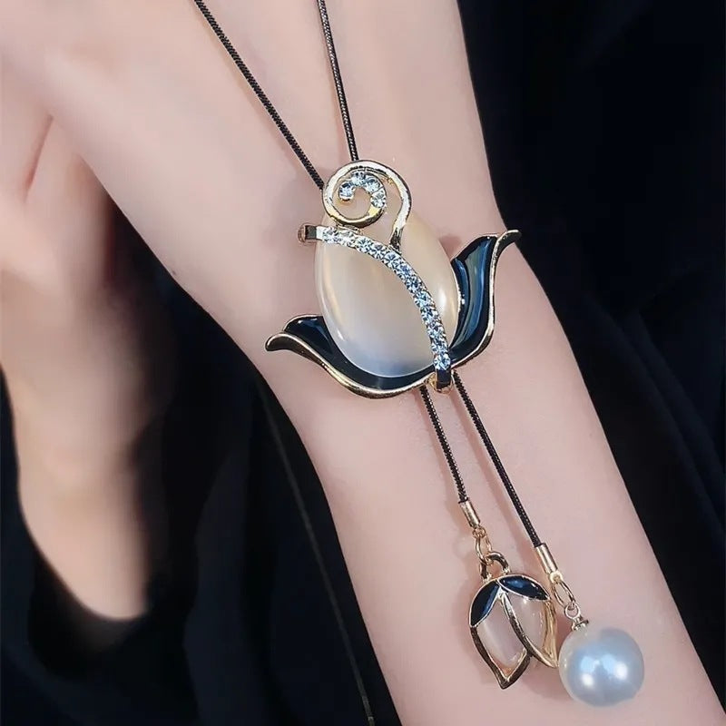 💝【Compra 1, llévate 1 gratis】✨Collar largo de tulipán con ojo de gato, cadena para suéter, accesorios de ropa-E
