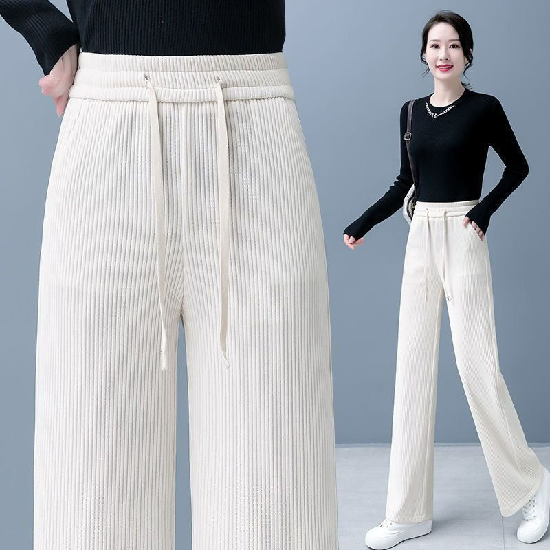 🔥【Compre uno y llévese otro gratis】 👖Nuevos pantalones casuales de terciopelo con perneras anchas, muy cómodos de usar.-E