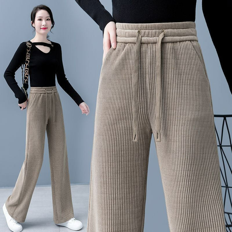 🔥【Compre uno y llévese otro gratis】 👖Nuevos pantalones casuales de terciopelo con perneras anchas, muy cómodos de usar.-E